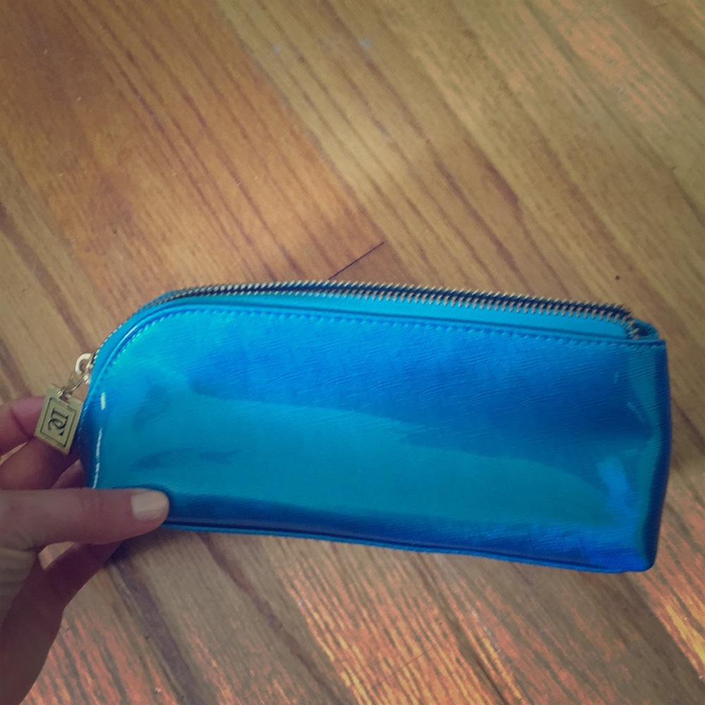 Electric blue cosmetic bag or clutch